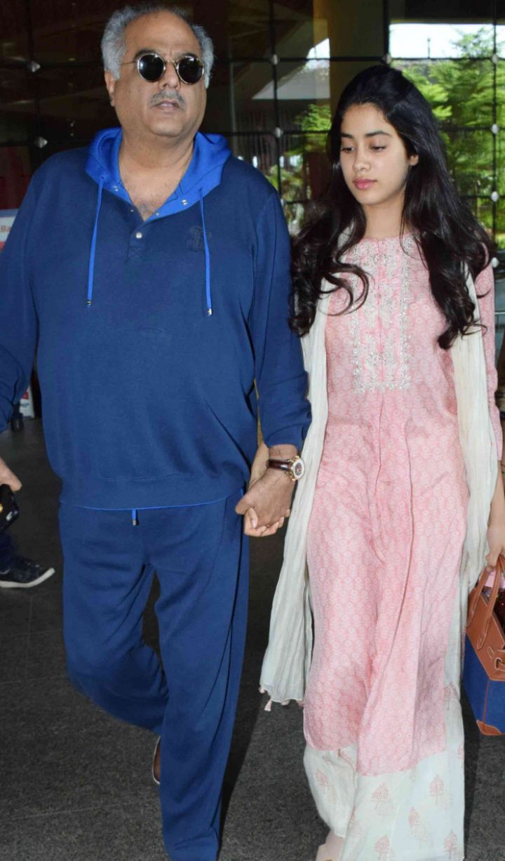 Janhvi Kapoor walks hand-in-hand with father Boney as they arrive back in Mumbai