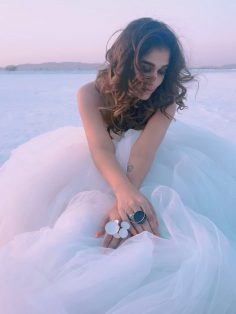 Nayanthara looks like a vision in white in this song shoot from Velaikkaran